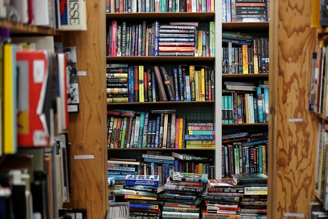 Crowded bookshelves in an independent bookshop.